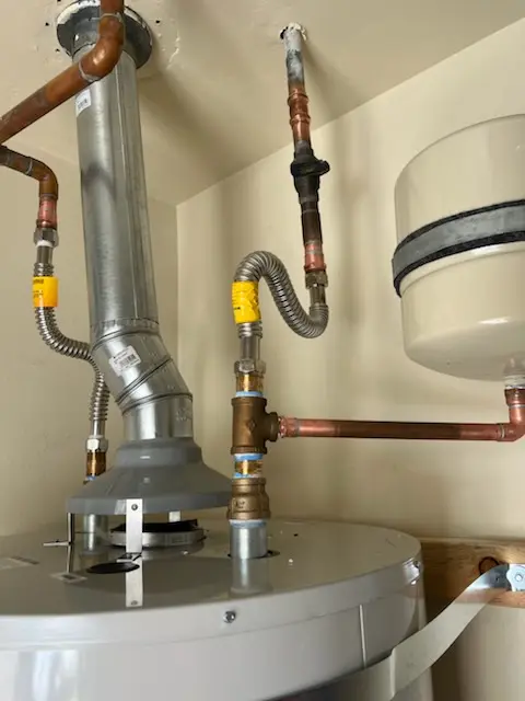 Water heater installation and plumbing repair in Scudder Park West